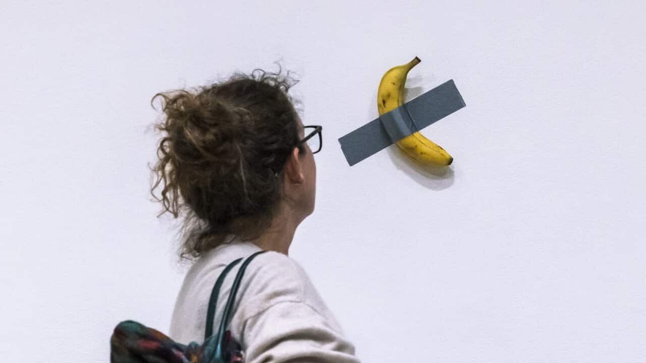 Banana duct-taped to a wall sells for almost $10 million at New York public sale